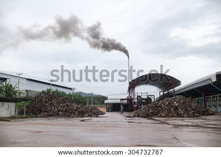 Industrial plant  factory with smoking chimneys