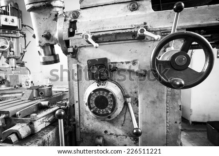 Black and white photo of a drilling machine tool machine
