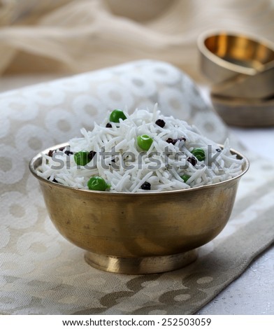 basmati rice in a brass bowl