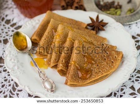 Pancakes with honey is a traditional Russian dish