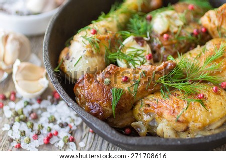 Delicious roast chicken with garlic and dill in a cast iron skillet