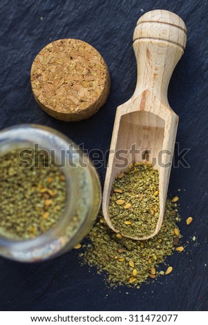 Zaatar -  middle Eastern  mixture of spices and seasonings for meat, poultry and salads. Selective focus
