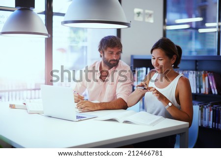 Teamwork in office, businesspeople using technology, two professionals having good idea at discussion, office people working with technology, business meeting of two partners