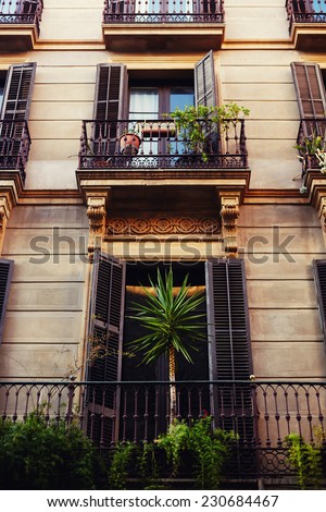 Balcony, Spanish city of Barcelona, Mediterranean architecture, old balcony with plants