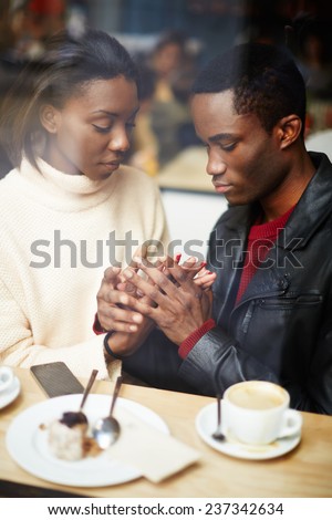 Two people in cafe enjoying the time spending with each other, portrait of young couple in love at coffee shop, young couple at san valentines day, handsome man declaration of love for his girlfriend