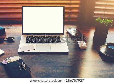 Successful businessman or entrepreneur table with style accessories, euro bills, open laptop computer or notebook with white blank copy space screen for text information or content, e-business, filter