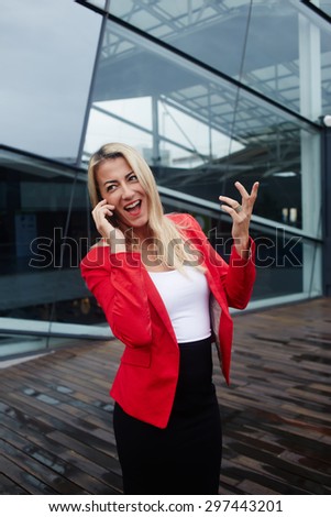 Successful happy female talking on cell phone, elegant lady in corporate clothing have telephone conversation outdoors, confident luxury businesswoman talk on smart phone standing near office building