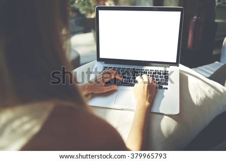 Closeup image of woman\'s hands keyboarding on net-book with blank copy space screen for your text message or advertising content, young female writing letter or e-mail on laptop computer to her friend