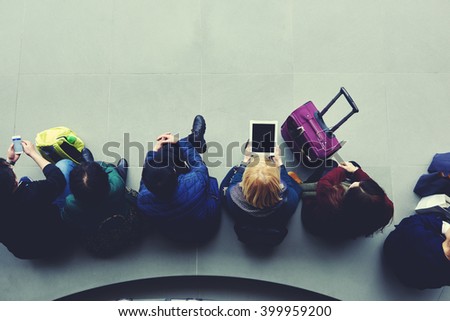 Top view of women tourists are booking on-line hotel for night by using mobile phone and portable touch pad. Young hipster girl is holding digital tablet with empty copy space screen for your content