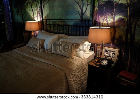 antique scary dimming bedroom with the spooky wallpaper for halloween