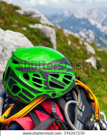 Green helmet, harness and Y-shaped lanyard with threaded rope energy absorber