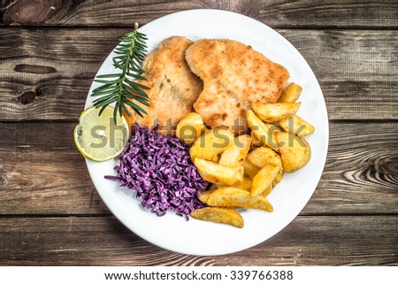 [Obrazek: stock-photo-fried-salmon-potatoes-and-ve...766388.jpg]
