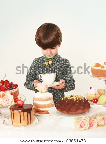 Birthday Cake Shot on Little Boy With Cakes  Happy Birthday Party Studio Shot Stock Photo