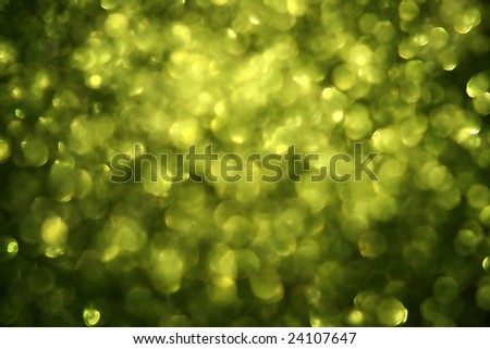 Abstract green background with unfocused light sources