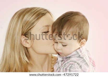 Mother and son, kissing