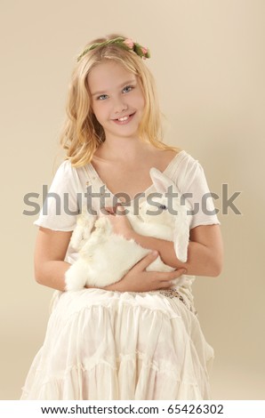 Beautiful Girl with white rabbit / Alice in wonderland