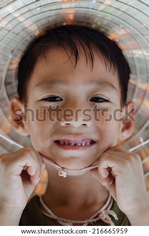 Face Smiling of Cute Asian Boy to Close-Up.