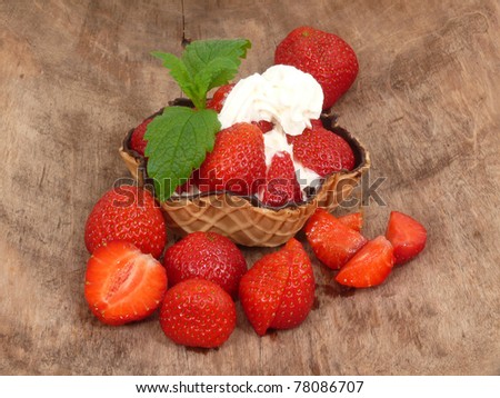 waffle bowl with fresh strawberries and cream