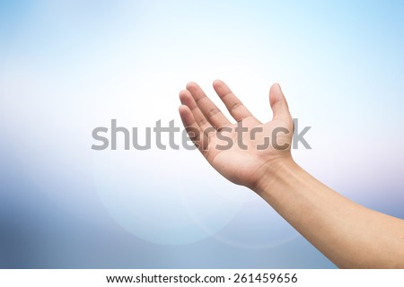 Two hands open palm gesture  on blurred sea background