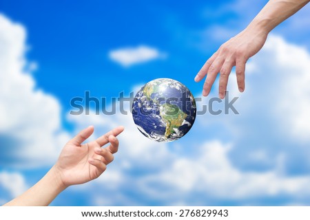 hands reaching the world for heal together, save the world concept ,Elements of this image furnished by NASA