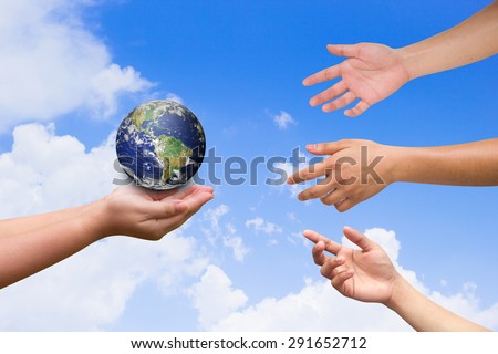 three hands reaching the world for heal together, safe the world concept ,Elements of this image furnished by NASA