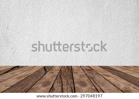 old vintage wooden desk table with white cement backgrounds textured , put and show your products on this backgrounds.