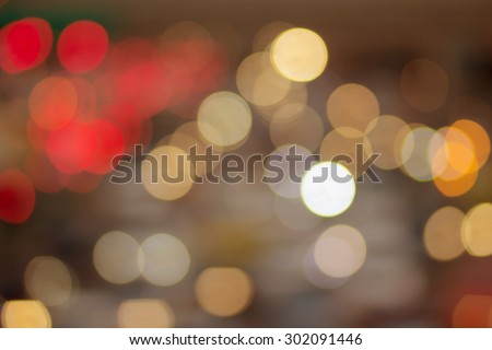 Abstract traffic circle light blurred backgrounds,out of focused concept:blurred backgrounds with colorful bokeh light in warm tones.vintage styles.