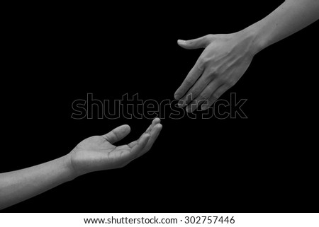 helping hand and hands praying on black background , helping hand concept.
