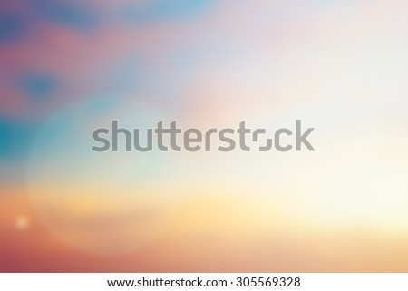 blurred backgrounds of early morning sky backgrounds with flare lights.blurred backgrounds concept.vintage tone styles.pastel colors concept.