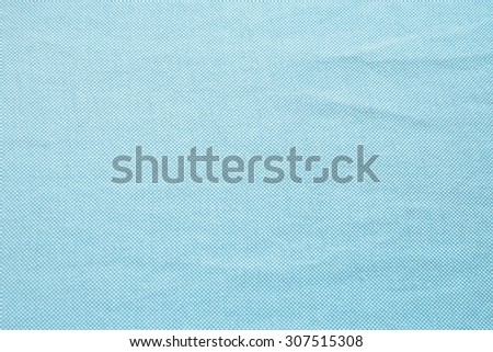 crumpled Cotton fabric texture seamless backgrounds in light blue turquoise tone color : fabric fiber texture in vintage tones styles backgrounds.