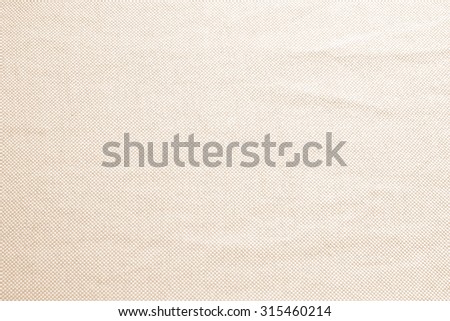 Abstract crumpled old rose colors fabric texture backgrounds : creased fabric textures in bright beige color tone.