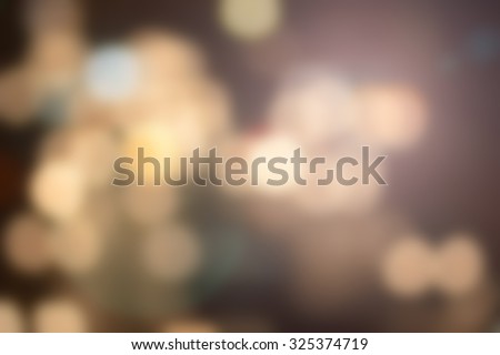 Blurred night city background with circle light. blur backgrounds concept.pastel tone.blur of bokeh circle light christmas festive backdrop concept.