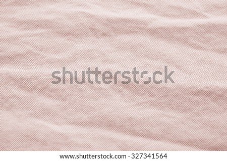 Abstract crumpled coral and salmon colors fabric texture backgrounds : rough and creased fabric textures in vintage sepia color style.wrinkle fabric burlap backdrop concept.