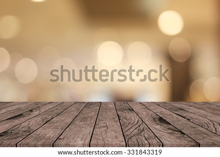 old vintage grungy red brown wood tabletop with blurred warm light colored backgrounds:grunge aged wooden paving with blurry warm cream light bokeh backdrop.put and show your products on this display.