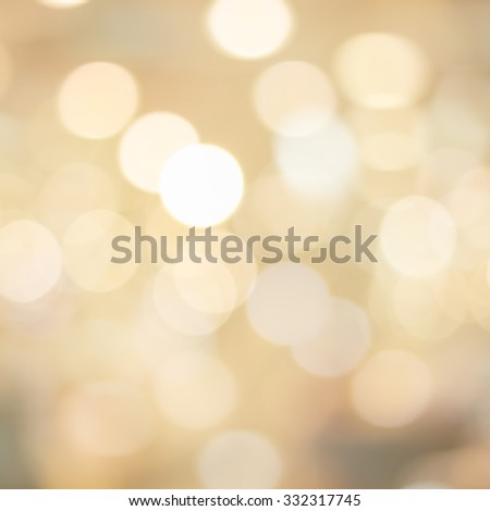 abstract blurred of golden colour backgrounds with circle lights.blur of bokeh circle light christmas festive backdrop concept:blur gold yellow backdrop concept.picture in sqaure  conceptual.