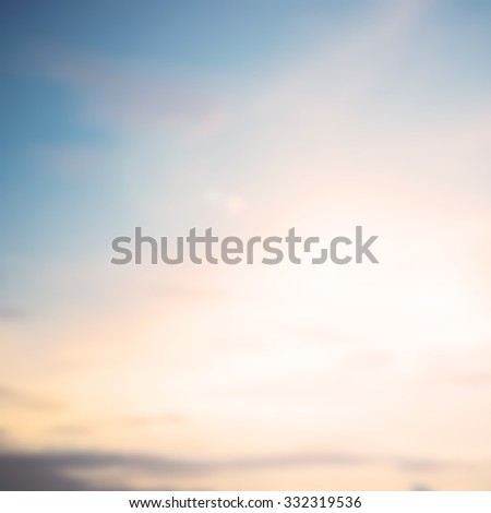 blurred abstract background of sunset sunrise in vintage warm tone color with flare light.blur backdrop square frame concept.summer and spring tropical wallpaper concept.display pastel color tone.