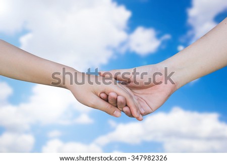 close up of humans hands holding together for cheerful/healing/love concept:couple lovers hands touching each other with love conceptual.kindness of humanity conception.