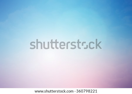 blurred beautiful natural landscape background with ray flare lights.blurry sunshine wallpaper concept.backdrop pastel tone.idyllic shores sundown hours.abstract dream magic coastline dramatic image.