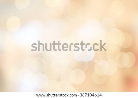 Blur shining brighten soft cream yellow wallpaper with circle lantern:abstract blurred background in light tone.blurry bulbs ball motion aura golden cream color backdrop.blurry sparkle glitter concept