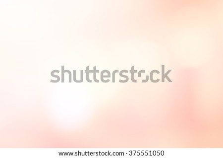 abstract blurred beautiful soft brightening pink background:blur old rose colorful backdrop with bokeh lucent light:beauty shiny wallpaper with lens flare light effect filter:vivid vintage tone image.