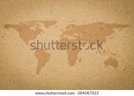 World map on tan texture board background vignette.wooden cork board beige brown cream color backdrop:silhouette planet earth screen wallpaper:retro antique board banner template.vintage effect tone.