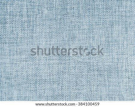 Abstract cyan blue sapphire color fabric texture background:rough/creased fabric textures in vintage color.wrinkle fabric burlap backdrop concept.garment textile wallpaper for banner template