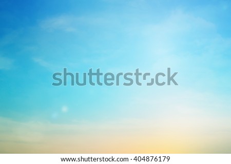 blurred colorful natural sky clouds landscape background with light.blurry sunshine wallpaper concept.backdrop pastel cool tone.blur idyllic shores sundown hour.abstract dream magic coastline dramatic