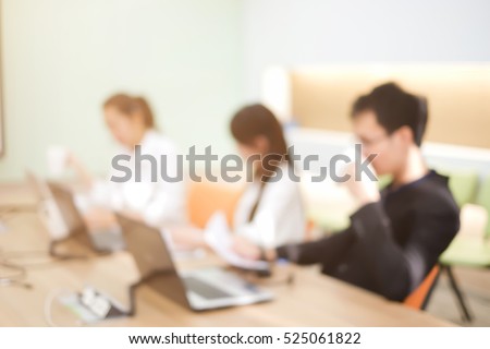 abstract blurred employee work in office room:group of teamwork asian staff :collaboration people concept.human resource department:take care customer service