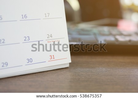 close up and soft focus on number 31 December of calendar on office desk:end of the year concept.schedule page paper for make important appointment:note meeting time:reminder or alert event:to do list