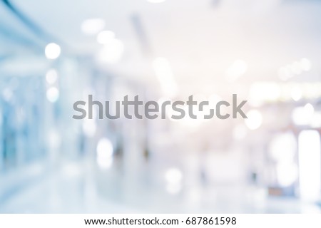 abstract blur contemporary office interior blue background with orange light filter effect