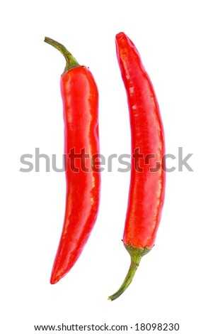 Two chilli peppers isolated on white