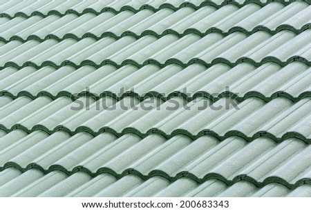 Closeup of the green clay roof tiles