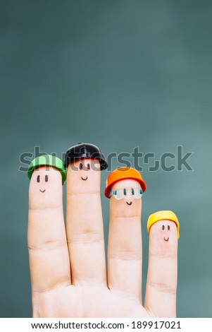 Four fingers with smiley faces
