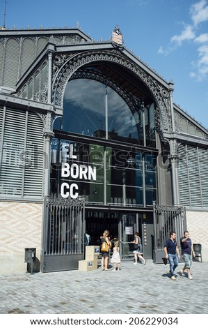 BARCELONA, SPAIN - JULY 12: Visitors leave El Born market in Barcelona, Spain on July 12, 2014. El Born market has become a major public cultural center in Barcelona where many exhibitions are held.